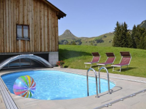 Modern apartment with swimming pool in Damüls